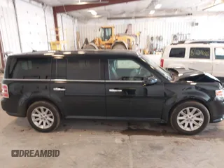 2010 Ford Flex SEL z VIN 2FMGK5CC7ABB22233, wystawiony jako IAAI lot #42191719 z przebiegiem 126 460 mil mil oraz . Historia ofert i sprzedaży dostępna na DreamBid. Obrazek 13.
