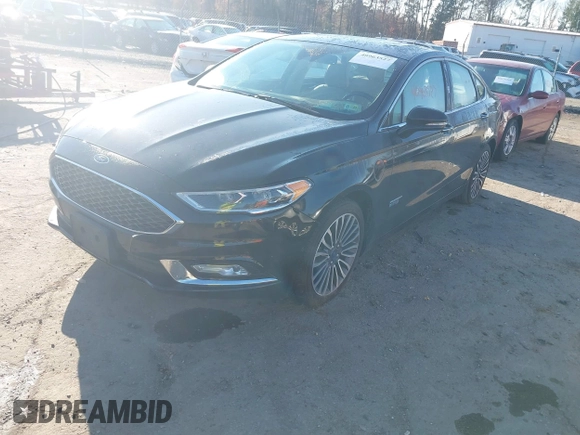 2017 Ford Fusion Titanium with VIN 3FA6P0SU2HR309895, listed as a IAAI auction lot 40963527 with 80,761 mi miles and . Bid and sale history available at DreamBid. Image 2.