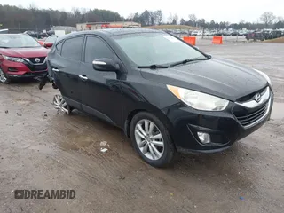 2013 Hyundai Tucson GLS with VIN KM8JU3AC7DU599993, listed as a IAAI auction lot 41541262 with 220,951 mi miles. Bid and sale history available at carsss.com. Image 1.