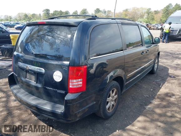 2010 Chrysler Town & Country Touring with VIN 2A4RR5D12AR359509, listed as a IAAI auction lot 42178261 with 160,707 mi miles and . Bid and sale history available at DreamBid. Image 4.