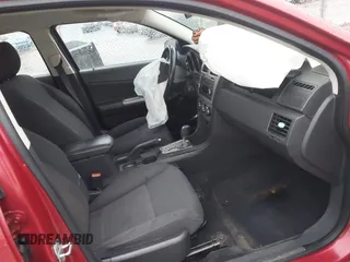 2009 Dodge Avenger SXT with VIN 1B3LC56BX9N523621, listed as a IAAI auction lot 41068673 with 174,055 mi miles. Bid and sale history available at carsss.com. Image 5.