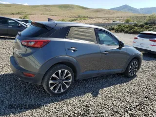 2019 Mazda CX-3 Touring z VIN JM1DKFC72K0430266, wystawiony jako Copart lot #59765545 z przebiegiem 77 534 mil mil oraz Szkoda całkowita • Salvage title. Historia ofert i sprzedaży dostępna na DreamBid. Obrazek 3.