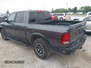 2017 Ram 1500 Rebel with VIN 1C6RR7YT5HS610293, listed as a IAAI auction lot 42454064 with 103,515 mi miles and . Bid and sale history available at DreamBid. Image 3.