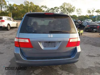 2007 Honda Odyssey EX-L z VIN 5FNRL38717B035384, wystawiony jako IAAI lot #41976861 z przebiegiem 211 640 mil mil oraz . Historia ofert i sprzedaży dostępna na DreamBid. Obrazek 16.