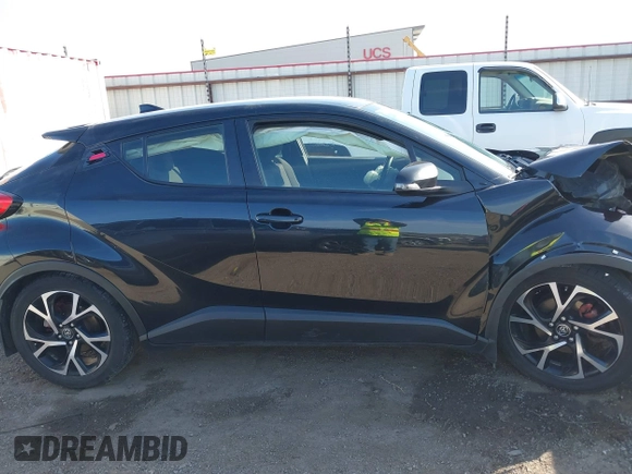 2018 Toyota C-HR XLE z VIN JTNKHMBX7J1004430, wystawiony jako IAAI lot #41780739 z przebiegiem 148 882 mil mil oraz . Historia ofert i sprzedaży dostępna na DreamBid. Obrazek 14.
