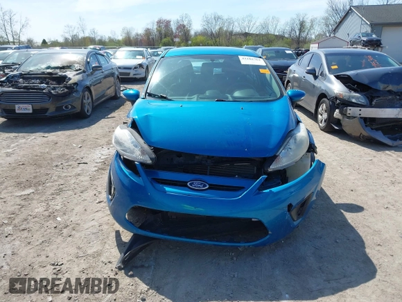 2013 Ford Fiesta SE with VIN 3FADP4EJ9DM158657, listed as a IAAI auction lot 42102761 with 170,845 mi miles and . Bid and sale history available at DreamBid. Image 12.