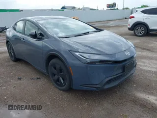 2024 Toyota Prius LE z VIN JTDACAAU5R3032263, wystawiony jako IAAI lot #42112910 z przebiegiem 16 487 mil mil oraz . Historia ofert i sprzedaży dostępna na DreamBid. Obrazek 1.