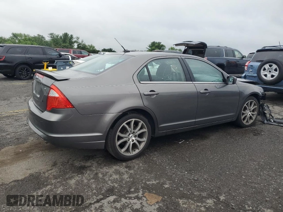 2012 Ford Fusion SE with VIN 3FAHP0HA3CR127721, listed as a Copart auction lot 64726335 with 175,332 mi miles and Salvage title. Bid and sale history available at DreamBid. Image 3.