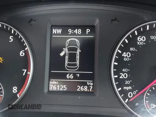 2012 Volkswagen Passat SE z VIN 1VWBP7A39CC056590, wystawiony jako IAAI lot #41879975 z przebiegiem 76 125 mil mil oraz . Historia ofert i sprzedaży dostępna na DreamBid. Obrazek 7.