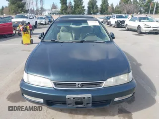 1997 Honda Accord EX w/Leather with VIN 1HGCD7158VA014025, listed as a IAAI auction lot 41582343 with 302,660 mi miles. Bid and sale history available at carsss.com. Image 6.