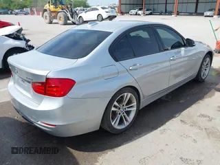 2014 BMW 3 Series 328i xDrive with VIN WBA3B5C51EP543588, listed as a IAAI auction lot 42105211 with 117,717 mi miles and . Bid and sale history available at DreamBid. Image 4.