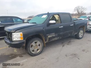 2009 Chevrolet Silverado 1500 LTZ with VIN 3GCEK33329G138137, listed as a IAAI auction lot 41145088 with 207,522 mi miles. Bid and sale history available at carsss.com. Image 2.