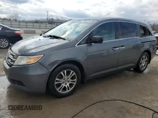 2013 Honda Odyssey EX z VIN 5FNRL5H40DB033400, wystawiony jako Copart lot #50552155 z przebiegiem 223 770 mil mil oraz Nie do naprawy. Historia ofert i sprzedaży dostępna na DreamBid. Obrazek 1.