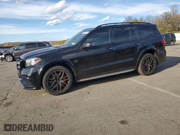 2018 Mercedes-Benz GLS 63 AMG with VIN 4JGDF7FE5JB060580, listed as a Copart auction lot 74040014 with 62,749 mi miles and Salvage title. Bid and sale history available at DreamBid. Image 1.
