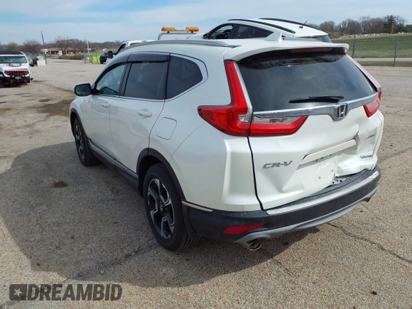 2017 Honda CR-V Touring with VIN 5J6RW2H95HL044505, listed as a IAAI auction lot 41856975 with 117,826 mi miles. Bid and sale history available at carsss.com. Image 3.