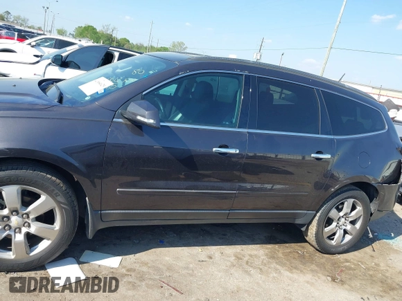 2016 Chevrolet Traverse LTZ z VIN 1GNKRJKD1GJ301277, wystawiony jako IAAI lot #41884629 z przebiegiem 106 338 mil mil oraz . Historia ofert i sprzedaży dostępna na DreamBid. Obrazek 14.