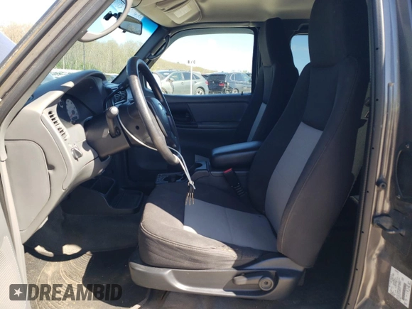 2005 Ford Ranger XLT z VIN 1FTZR45E15PA82912, wystawiony jako Copart lot #55155295 z przebiegiem 98 926 mil mil oraz Czysty tytuł • Clean title. Historia ofert i sprzedaży dostępna na DreamBid. Obrazek 7.