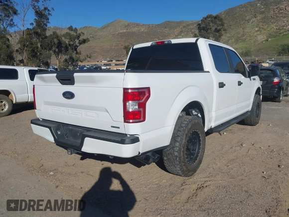 2020 Ford F-150 XL with VIN 1FTEW1CP7LKD24719, listed as a IAAI auction lot 41670273 with 57,188 mi miles. Bid and sale history available at carsss.com. Image 4.