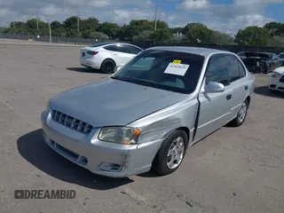 2002 Hyundai Accent GL with VIN KMHCG45C82U268756, listed as a IAAI auction lot 41569829 with 89,752 mi miles. Bid and sale history available at carsss.com. Image 6.