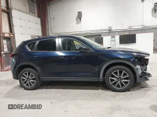 2018 Mazda CX-5 Touring with VIN JM3KFBCM5J0434716, listed as a IAAI auction lot 41738956 with 108,264 mi miles and . Bid and sale history available at DreamBid. Image 14.