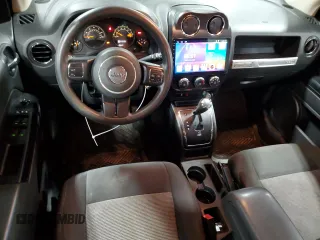 2014 Jeep Compass Sport with VIN 1C4NJDBB3ED793061, listed as a Copart auction lot 45112075 with 146,113 mi miles and Salvage Title. Bid and sale history available at carsss.com. Image 8.