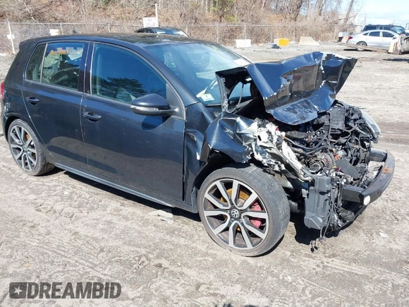 2012 Volkswagen GTI w/Sunroof & Navi PZEV z VIN WVWGD7AJXCW209878, wystawiony jako IAAI lot #41860048 z przebiegiem 154 266 mil mil oraz . Historia ofert i sprzedaży dostępna na DreamBid. Obrazek 1.