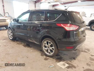 2016 Ford Escape Titanium with VIN 1FMCU0JX3GUB70607, listed as a IAAI auction lot 41727421 with 106,857 mi miles. Bid and sale history available at carsss.com. Image 3.