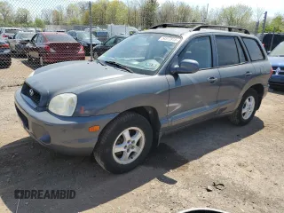 2001 Hyundai Santa Fe GLS with VIN KM8SC83D41U069325, listed as a Copart auction lot 54377815 with 51,574 mi miles and Clean Title. Bid and sale history available at carsss.com. Image 1.