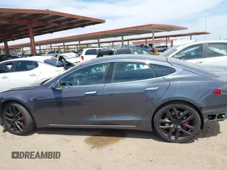 2018 Tesla Model S 75D with VIN 5YJSA1E43JF260547, listed as a IAAI auction lot 42346240 with 89,637 mi miles and . Bid and sale history available at DreamBid. Image 13.