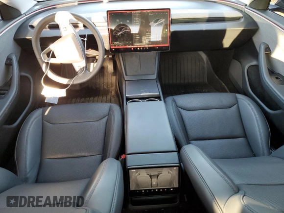 2024 Tesla Model 3 z VIN 5YJ3E1EA7RF760219, wystawiony jako Copart lot #52173225 z przebiegiem 6 730 mil mil oraz Szkoda całkowita • Salvage title. Historia ofert i sprzedaży dostępna na DreamBid. Obrazek 8.