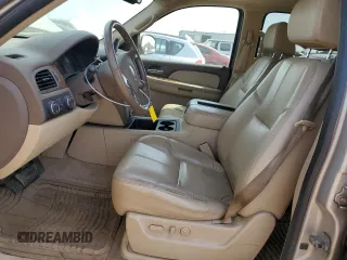 2007 GMC Yukon SLT with VIN 1GKFK13057J305802, listed as a Copart auction lot 57156884 with 218,494 mi miles and Salvage Title. Bid and sale history available at carsss.com. Image 7.