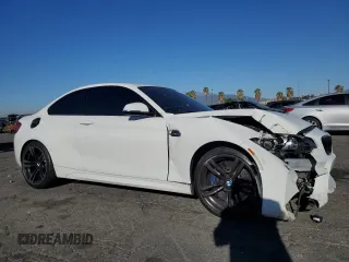 2017 BMW M2 with VIN WBS1H9C31HV887767, listed as a Copart auction lot 81957614 with 53,284 mi miles and Salvage Title. Bid and sale history available at carsss.com. Image 4.