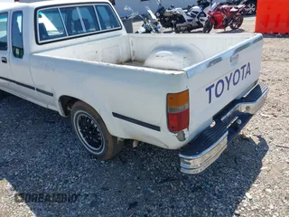 1989 Toyota Pickup z VIN JT4VN93D7K0002714, wystawiony jako IAAI lot #41971990 z przebiegiem 251 337 mil mil oraz . Historia ofert i sprzedaży dostępna na DreamBid. Obrazek 6.