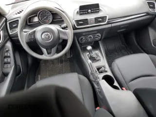 2014 Mazda 3 i SV with VIN JM1BM1T74E1148567, listed as a Copart auction lot 50977115 with 85,792 mi miles and Salvage Title. Bid and sale history available at DreamBid. Image 8.