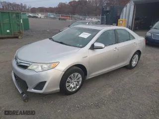 2012 Toyota Camry Hybrid XLE with VIN 4T1BD1FK4CU016397, listed as a IAAI auction lot 40642360 with 118,975 mi miles. Bid and sale history available at carsss.com. Image 2.