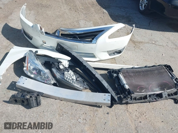 2013 Nissan Altima SV with VIN 1N4BL3APXDN551757, listed as a IAAI auction lot 41663814 with 102,547 mi miles and . Bid and sale history available at DreamBid. Image 12.
