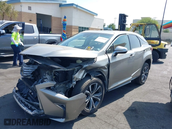 2017 Lexus RX 350 z VIN 2T2ZZMCA3HC041664, wystawiony jako IAAI lot #42379331 z przebiegiem 153 887 mil mil oraz . Historia ofert i sprzedaży dostępna na DreamBid. Obrazek 2.