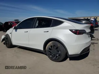 2022 Tesla Model Y Long Range with VIN 7SAYGAEE6NF506405, listed as a Copart auction lot 50392655 with 36,866 mi miles and Salvage Title. Bid and sale history available at DreamBid. Image 2.