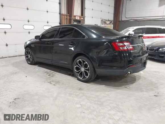 2015 Ford Taurus SHO with VIN 1FAHP2KT0FG132988, listed as a IAAI auction lot 42042314 with 192,974 mi miles and . Bid and sale history available at DreamBid. Image 3.