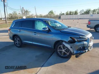 2019 Infiniti QX60 LUXE with VIN 5N1DL0MN1KC520817, listed as a IAAI auction lot 40931500 with 62,926 mi miles. Bid and sale history available at carsss.com. Image 13.