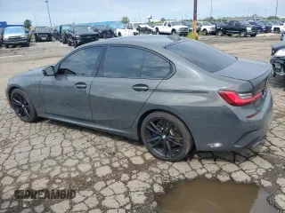 2022 BMW 3 Series M340i xDrive with VIN WBA5U9C07NFM06921, listed as a Copart auction lot 64725683 with 16,994 mi miles and . Bid and sale history available at DreamBid. Image 2.