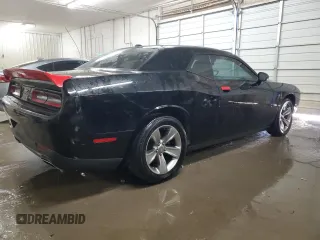2017 Dodge Challenger SXT z VIN 2C3CDZAG7HH658606, wystawiony jako Copart lot #52131045 z przebiegiem 100 223 mil mil oraz Szkoda całkowita • Salvage title. Historia ofert i sprzedaży dostępna na DreamBid. Obrazek 3.