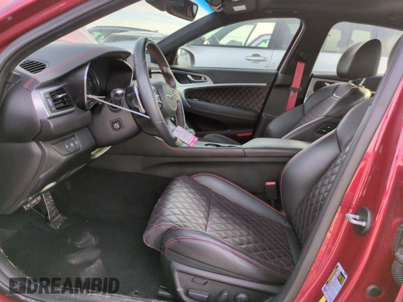 2022 Genesis G70 3.3T z VIN KMTG54TE3NU088591, wystawiony jako Copart lot #85343234 z przebiegiem 43 764 mil mil oraz Szkoda całkowita • Salvage title. Historia ofert i sprzedaży dostępna na DreamBid. Obrazek 7.
