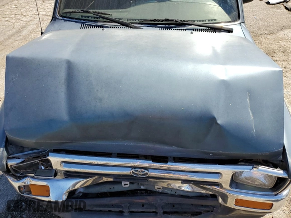 1994 Toyota Pickup DLX z VIN 4TARN81P2RZ175695, wystawiony jako Copart lot #50415385 z przebiegiem 258 048 mil mil oraz Szkoda całkowita • Salvage title. Historia ofert i sprzedaży dostępna na DreamBid. Obrazek 11.