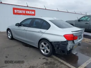 2013 BMW 3 Series 328i with VIN WBA3C1C51DF438981, listed as a IAAI auction lot 41741049 with 135,499 mi miles. Bid and sale history available at carsss.com. Image 3.