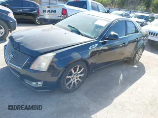 2009 Cadillac CTS RWD w/1SA with VIN 1G6DJ577890165194, listed as a IAAI auction lot 42024250 with 1 mi miles. Bid and sale history available at carsss.com. Image 2.