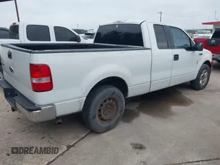 2005 Ford F-150 XLT with VIN 1FTPX12505FA38387, listed as a IAAI auction lot 42102959 with 224,788 mi miles. Bid and sale history available at carsss.com. Image 4.