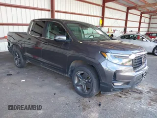 2023 Honda Ridgeline RTL with VIN 5FPYK3F52PB046921, listed as a IAAI auction lot 42389336 with 20,858 mi miles and . Bid and sale history available at DreamBid. Image 1.