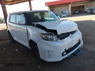 2014 Scion xB with VIN JTLZE4FE7EJ061838, listed as a IAAI auction lot 41848199 with 159,055 mi miles. Bid and sale history available at carsss.com. Image 1.