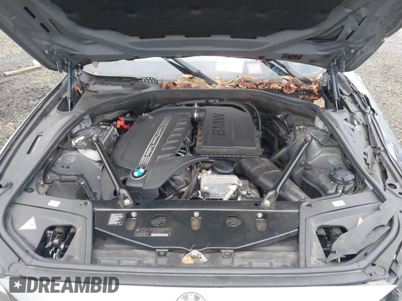 2014 BMW 5 Series 535i with VIN WBA5B1C51ED475098, listed as a IAAI auction lot 41517762 with 102,611 mi miles and . Bid and sale history available at carsss.com. Image 10.